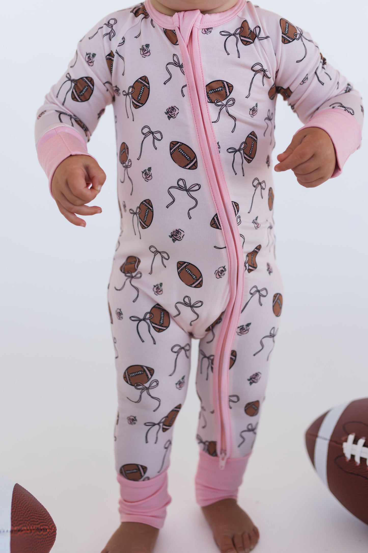 Blush Football Zipper Romper