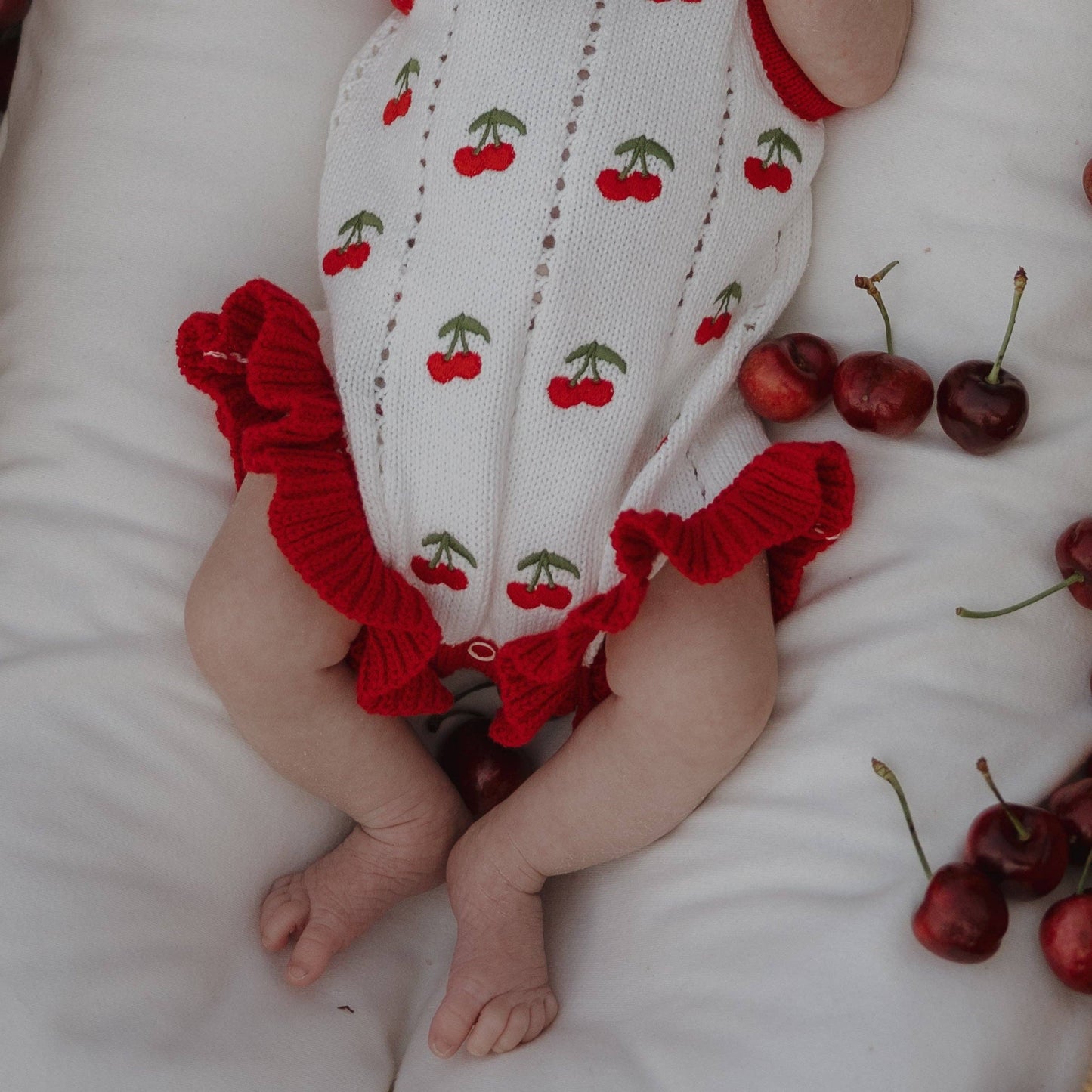 Cherry Knit Ruffle Romper