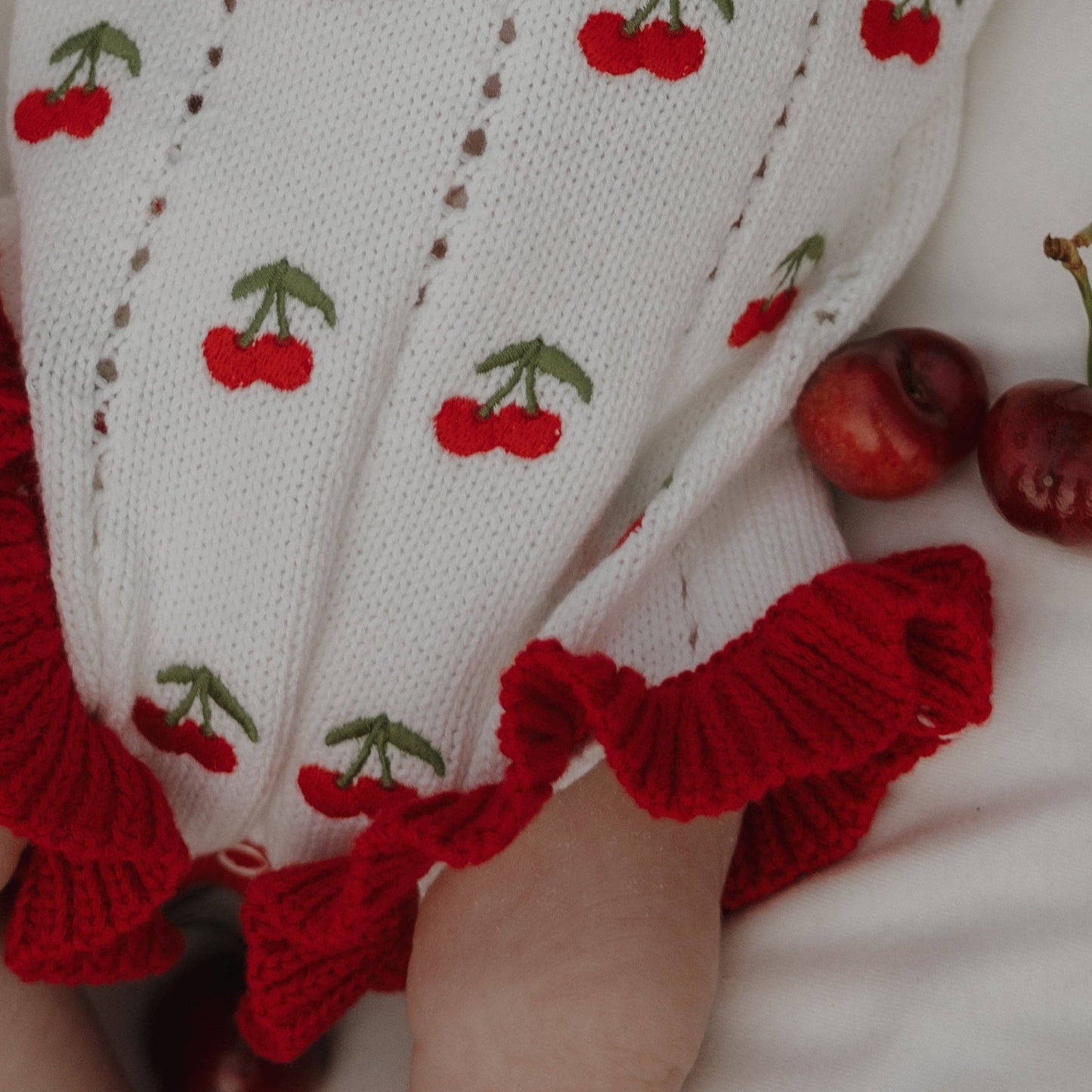Cherry Knit Ruffle Romper
